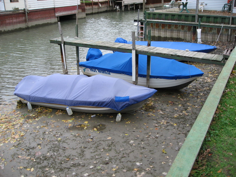 hotwired and houghtonlaker's boat on the mud.jpg